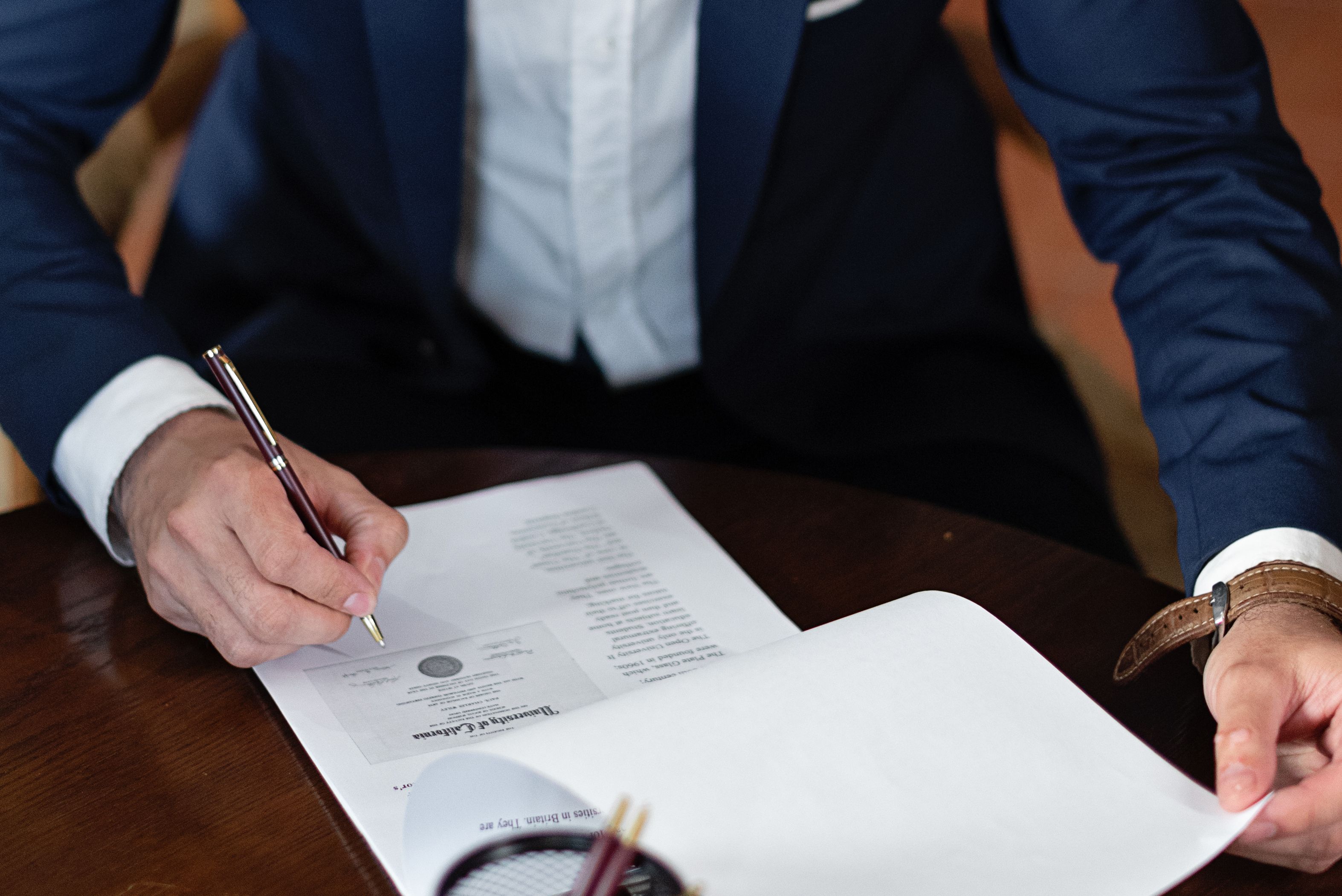 Estate planning attorney explaining the responsibilities of an executor to clients during an estate planning consultation.