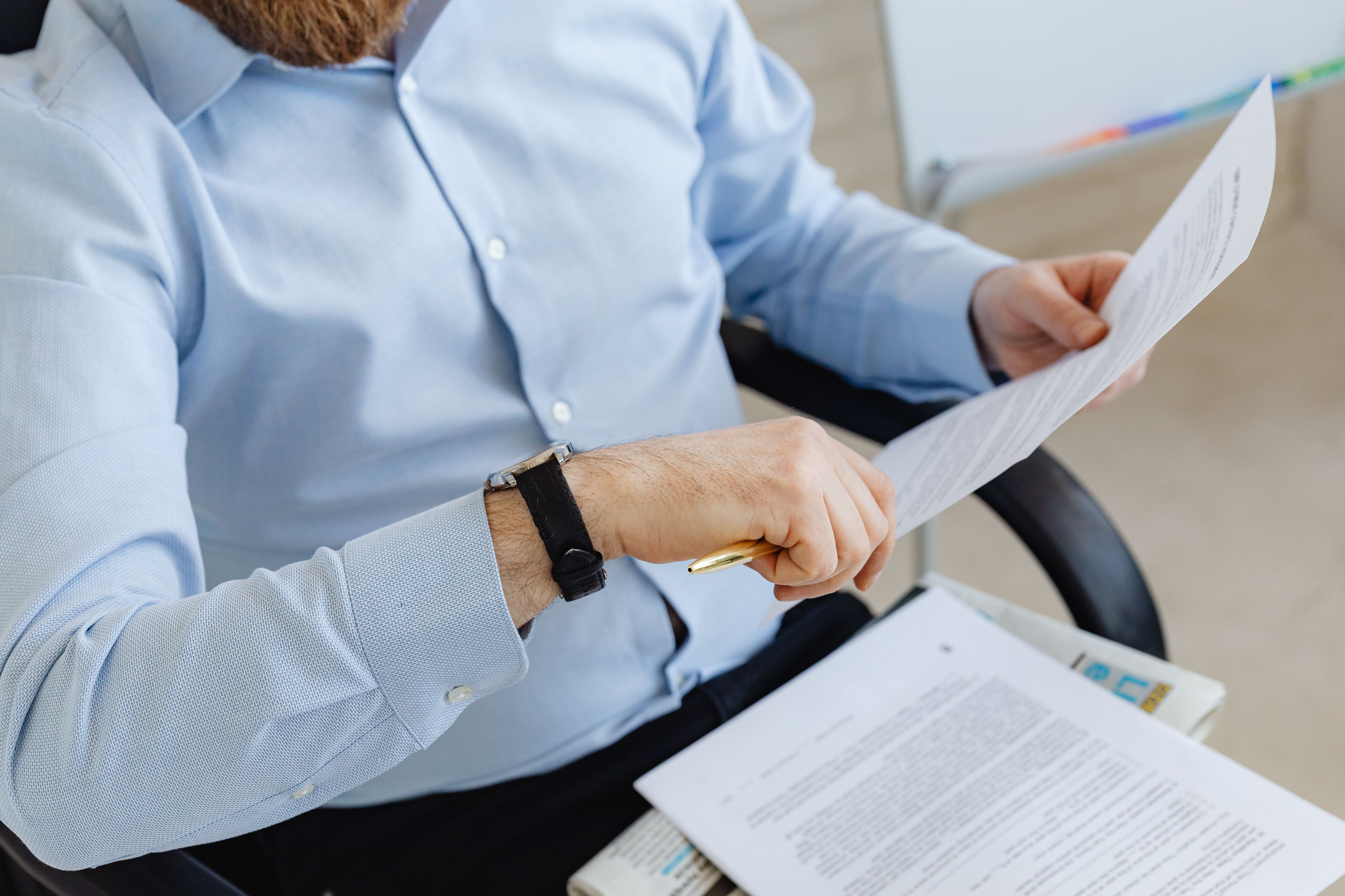 Estate planning attorney reviewing revocable living trust documents with clients during a consultation